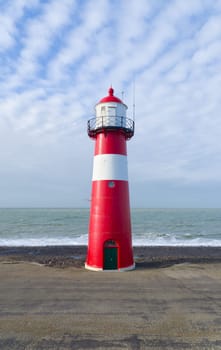 "Noorderhoofd""  lighthouse in Westkapelle, Netherlands. It has 3 colors of light, white (6000 candela), red and green (1800 candela). Together with the main lighthouse in the village it sends a light beacon to the ""Oostgat""."