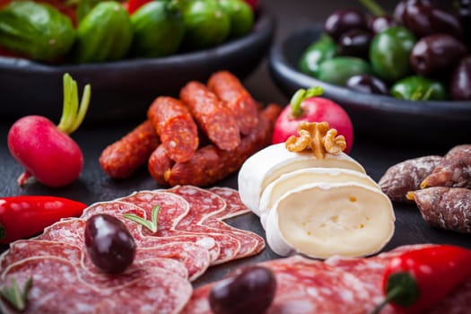 Catering platter with cheese and Antipasti