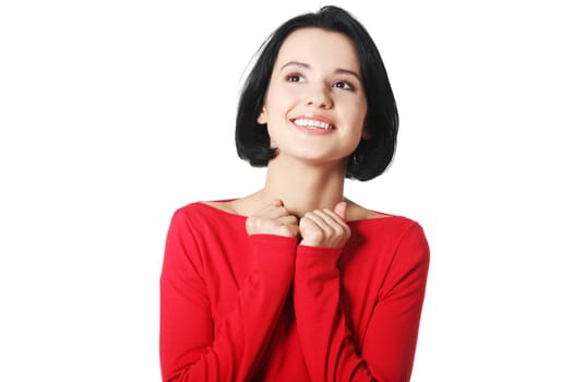 Shocked and excited woman looking up, isolated on white