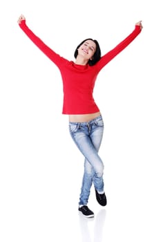 Excited happy young woman with fists up, isolated