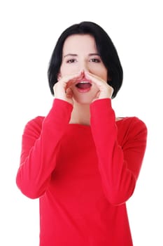 Pretty caucasian woman whispering gossip. Isolated on white.