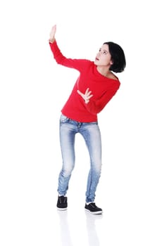 Scared woman defending herself, isolated on white background