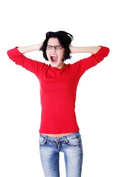 Closeup of frustrated young woman holding her ears, isolated on white