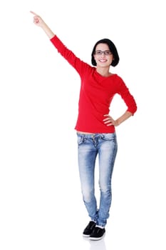 Happy , excited young woman pointing on copy space, isolated on white