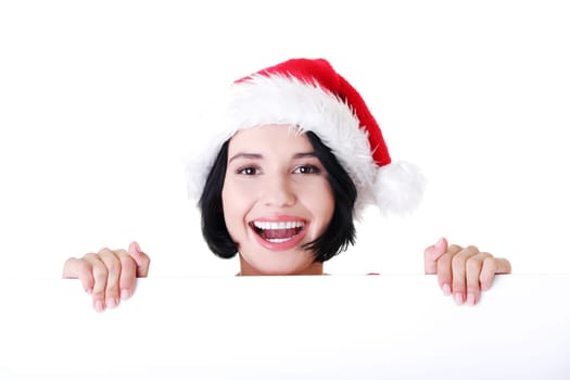 Santa girl holding blank board, isolated on white