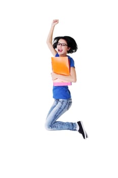 Happy female student jumping with a notebook isolated