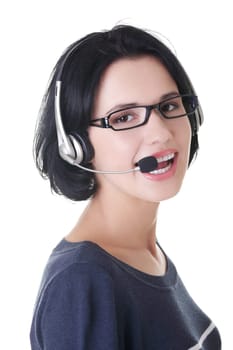 Closeup of attractive customer support representative smiling with headset on white background