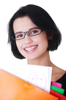 Happy student woman with notebooks showing her degree, isoalted on white background