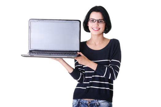 Portrait of young woman holding and showing screen of 17 inch laptop