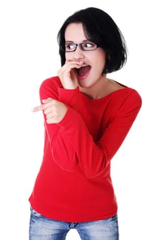 Happy , excited young woman pointing on copy space, isolated on white