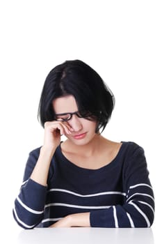 Young sad woman, have big problem or depression, over white background