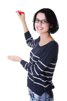 Young student woman writing something on abstract screen with red marker