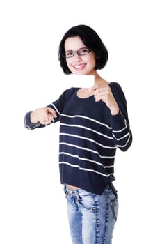 Beautiful smiling businesswoman with businesscard. Isolated on white