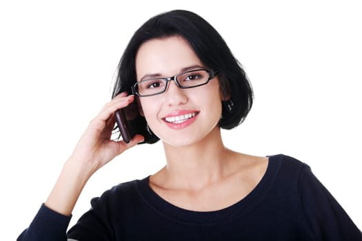 Young happy caucasian woman is calling with a mobile phone (smartphone) isolated on white