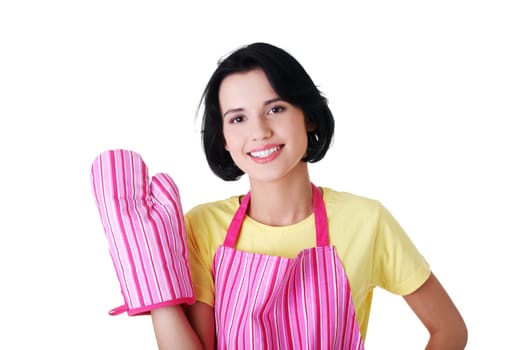 Young housewife in pink apron ang glove, isolated on white