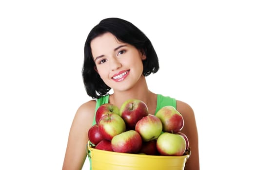 Smiling woman with apples , isolated on white