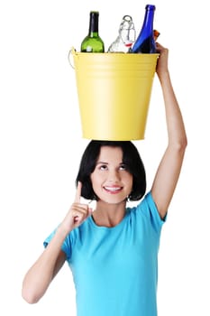 Beautiful young woman holding recycling bin isolated on white background.