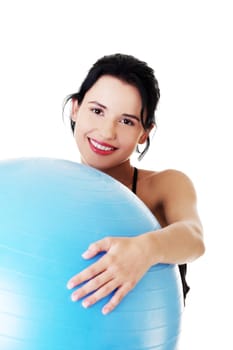 Beautiful young healthy lifestyle woman with pilates exercise ball.