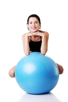 Beautiful young healthy lifestyle woman with pilates exercise ball.