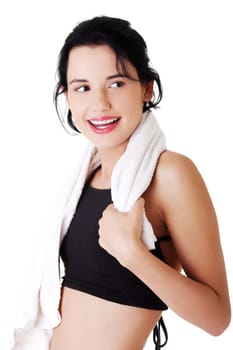 Happy smiling active woman in sports clothes with towel on neck