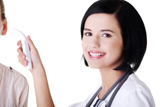 Female doctor or nurse checking temperature of her patient