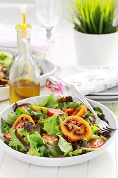 Delicious salad with tamarillos and olive oil