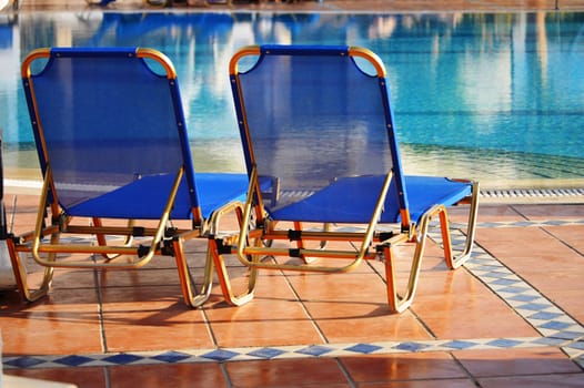 Swimming pool in touristic resort during summer time