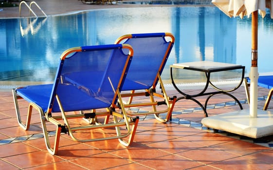 Swimming pool in touristic resort during summer time