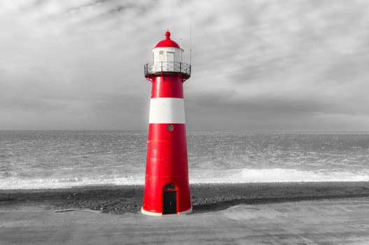"Noorderhoofd""  lighthouse in Westkapelle, Netherlands. It has 3 colors of light, white (6000 candela), red and green (1800 candela). Together with the main lighthouse in the village it sends a light beacon to the ""Oostgat""."