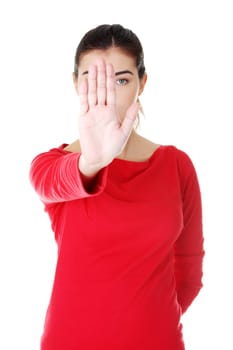 Hold on, Stop gesture showed by young woman hand