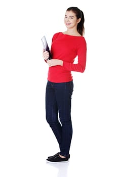 Happy student woman with notebook, isolated on white background