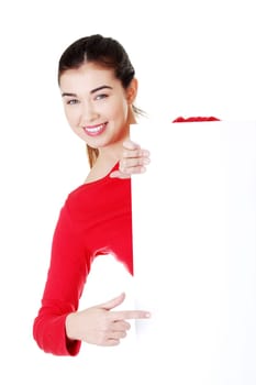 Portrait young happy woman with blank board , isolated on white