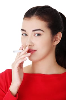 Young woman smoking electronic cigarette (ecigarette), isolated on white