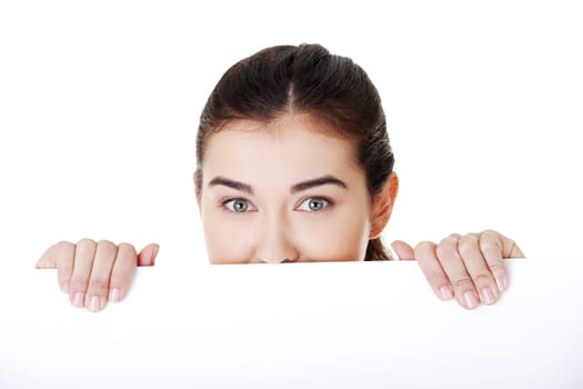 Portrait young happy woman with blank board , isolated on white