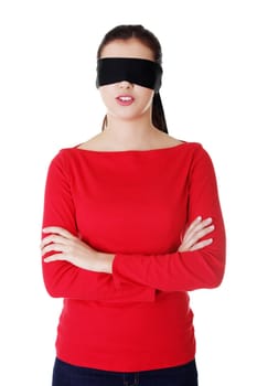 Portrait of the young woman blindfold , isolated on white