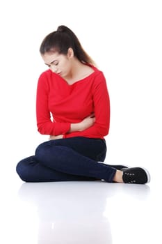 Young woman with stomach issues,isolated on white