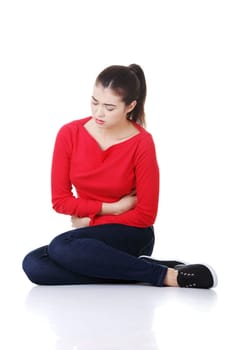 Woman with stomach issues isolated on white background