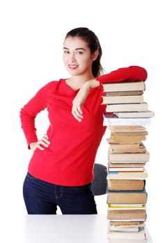Happy young student woman with books, isolated on white background