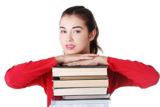 Happy young student woman with books, isolated on white background