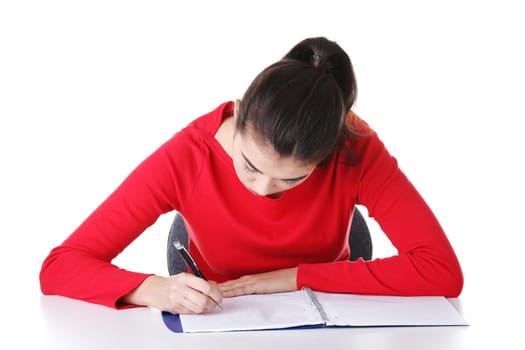Adult student woman learnig at the desk, isolated on white background