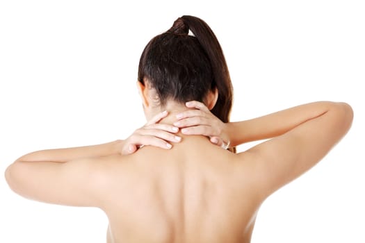 Young woman with pain in her back. Isolated on white