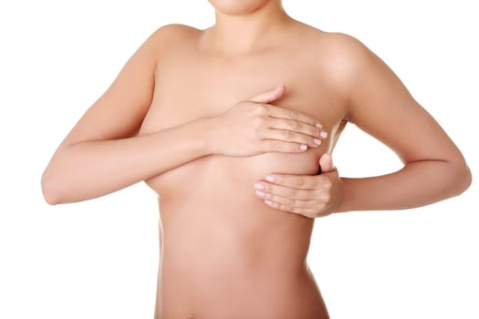 Woman examining breast mastopathy or cancer. Isolated on white