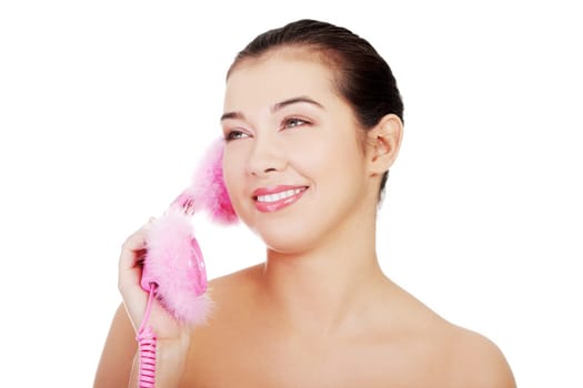 Happy woman on the phone, isolated on white
