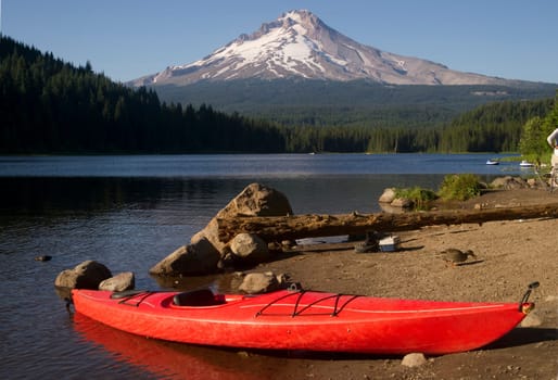 A Beautiful Recreation Area with a Single Red Kayak on Shore Trillium Lake Mount Hood Oregon