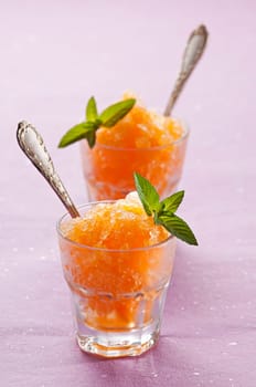 Fresh orange granita with mint close up shoot