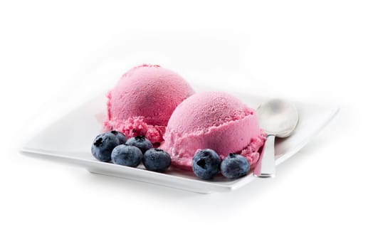 Fresh blueberry ice cream on white background close up