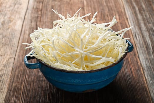 Sliced cabbage in a bowl close up