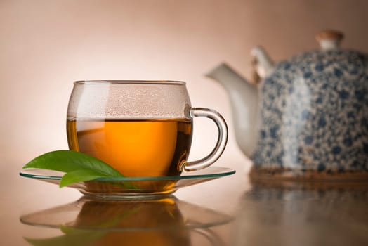 Cup of hot green tea close up shoot