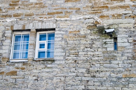 The chamber of video observation on a wall of a building near a window