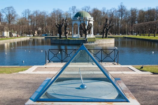 Ancient sundial at a pond in park Kadriorg, Tallinn